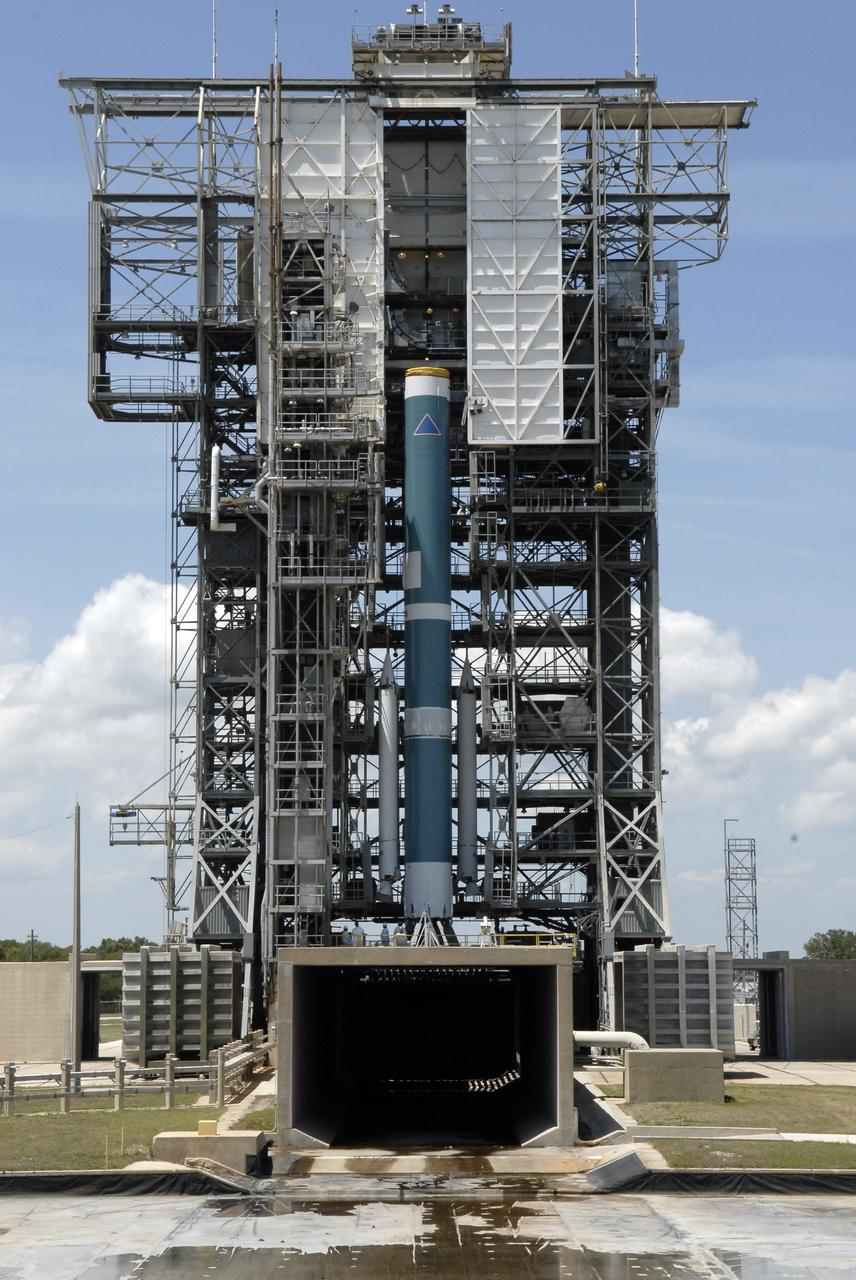 CAPE CANAVERAL, Fla. – On Launch Complex 17-B at Cape Canaveral Air Force Station, the mobile service tower encloses the first stage of the Delta II rocket. The boosters in the tower will be attached to the rocket for launch of the STSS Demonstrator spacecraft. The STSS Demonstrators is a midcourse tracking technology demonstrator and is part of an evolving ballistic missile defense system. STSS is capable of tracking objects after boost phase and provides trajectory information to other sensors. It will be launched by NASA for the Missile Defense Agency on July 29. Photo credit: NASA/Kim Shiflett
