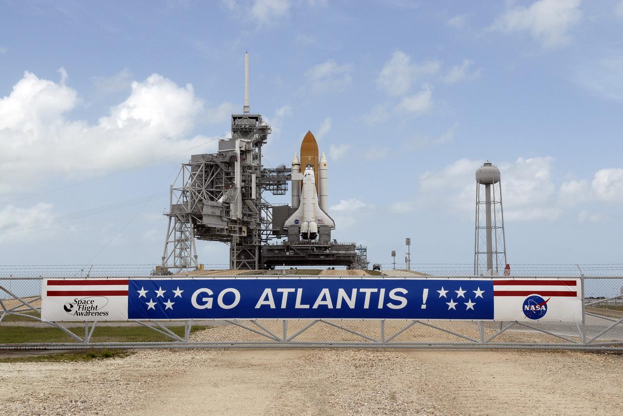 CAPE CANAVERAL, Fla. – On Launch Pad 39A at NASA's Kennedy Space Center in Florida, space shuttle Atlantis is in full view after rollback of the rotating service structure.  The rollback enables delivery and transfer of Atlantis' payload on April 18. After space shuttle Endeavour's rollout to Launch pad 39B at NASA's Kennedy Space Center in Florida this morning, two different shuttles now are poised on two different launch pads in full view.  Near the top of the  shuttle is the White Room at the end of the orbiter access arm, 147 feet above the pad. When in place against the shuttle, the White Room provides access into the crew compartment on the shuttle. With the space shuttle fleet set for retirement in 2010, this is expected to be the final time two shuttles will be on launch pads at the same time.  Endeavour will stand by at pad B in the unlikely event that a rescue mission is necessary during space shuttle Atlantis' upcoming mission. Atlantis is targeted to launch May 12. After Endeavour is cleared from its duty as a rescue spacecraft, it will be moved to Launch Pad 39A for its STS-127 mission to the International Space Station. That flight is targeted for launch June 13.    Photo credit: NASA/Kim Shiflett