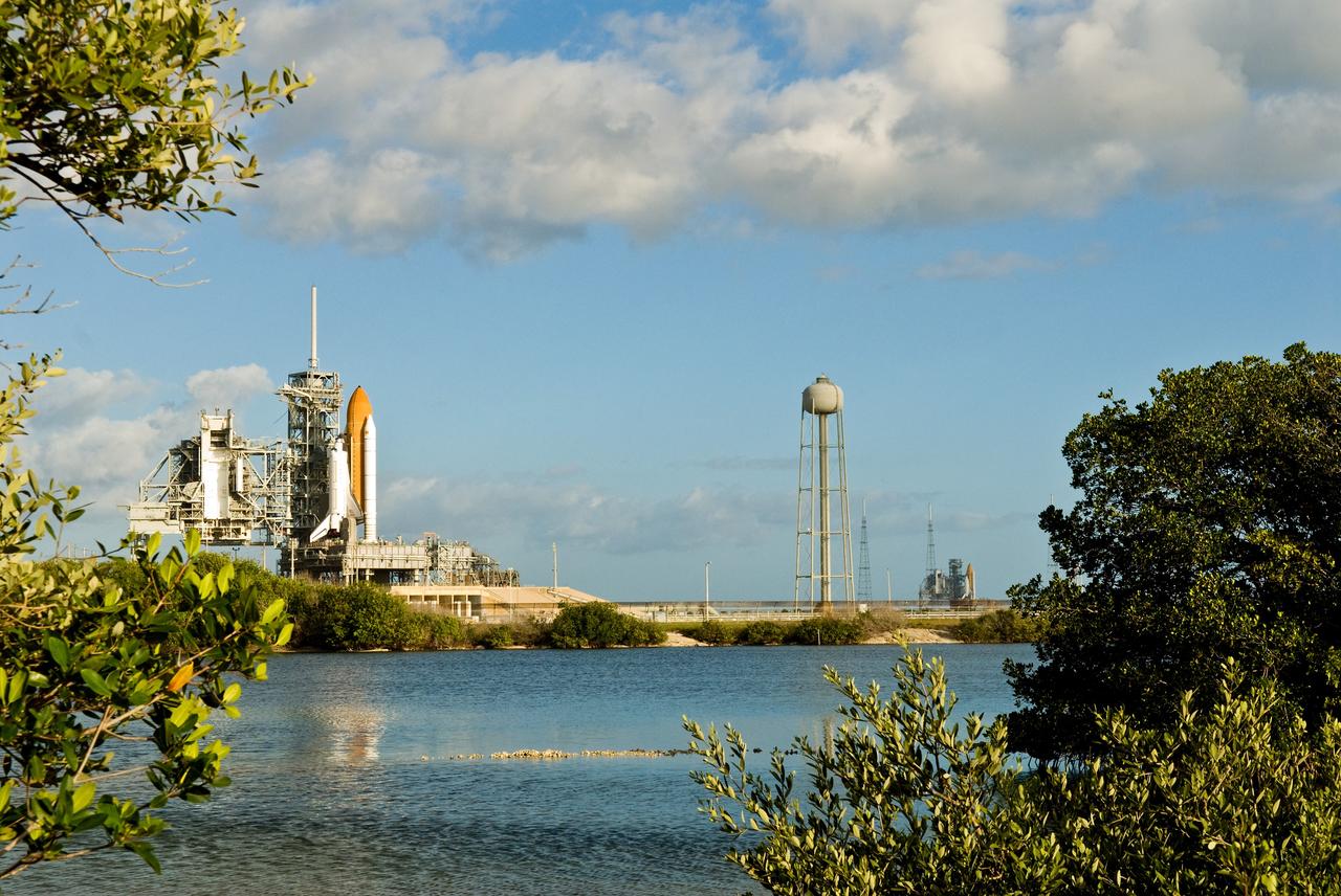CAPE CANAVERAL, Fla. –– Seen on Launch Pads 39A and 39B at NASA's Kennedy Space Center in Florida are shuttles on both pads. At left is space shuttle Atlantis, poised for the STS-125 mission targeted to launch May 12, and at right is space shuttle Endeavour. Endeavour will be prepared on the pad for liftoff in the unlikely event that a rescue mission is necessary following space shuttle Atlantis' launch May 12 on the STS-125 mission to upgrade NASA's Hubble Space Telescope. After Atlantis is cleared to land, Endeavour will move to Launch Pad 39A for its upcoming STS-127 mission to the International Space Station, targeted to launch June 13. Photo credit: NASA/Jack Pfaller