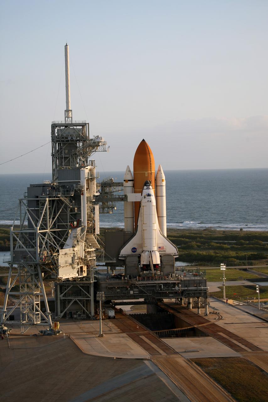 CAPE CANAVERAL, Fla. –– Space shuttle Atlantis atop the mobile launcher platform straddles the flame trench on Launch Pad 39A at NASA's Kennedy Space Center in Florida. Behind it is the Atlantic Ocean. Atlantis has been joined by space shuttle Endeavour on Launch Pad 39B. This is probably the final time two shuttles will be on launch pads at the same time with the space shuttle fleet set for retirement in 2010. Endeavour will be prepared on the pad for liftoff in the unlikely event that a rescue mission is necessary following space shuttle Atlantis' launch on the STS-125 mission to service NASA's Hubble Space Telescope. After Atlantis is cleared to land, Endeavour will move to Launch Pad 39A for its upcoming STS-127 mission to the International Space Station, targeted to launch June 13. Photo credit: NASA/Dimitri Gerondidakis
