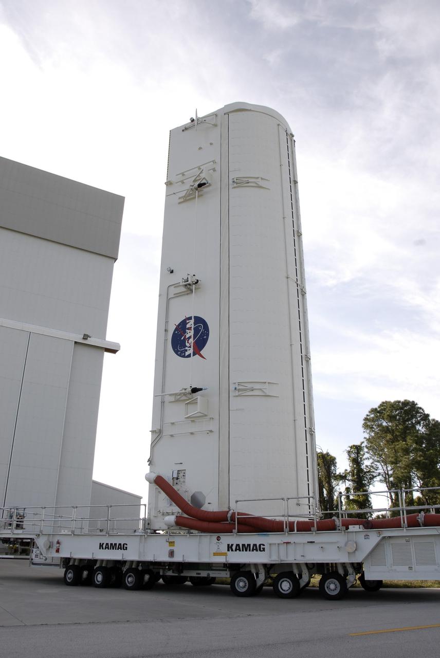 CAPE CANAVERAL, Fla. –– The payload canister with the Hubble Space Telescope equipment leaves the Vertical Processing Facility at NASA's Kennedy Space Center in Florida. The canister will deliver the hardware to Launch Pad 39A for transfer to space shuttle Atlantis' payload bay. Atlantis' 11-day STS-125 mission to service Hubble is targeted for launch May 12. The flight will include five spacewalks in which astronauts will refurbish and upgrade the telescope with state-of-the-art science instruments. As a result, Hubble's capabilities will be expanded and its operational lifespan extended through at least 2014. Photo credit: NASA/Kim Shiflett