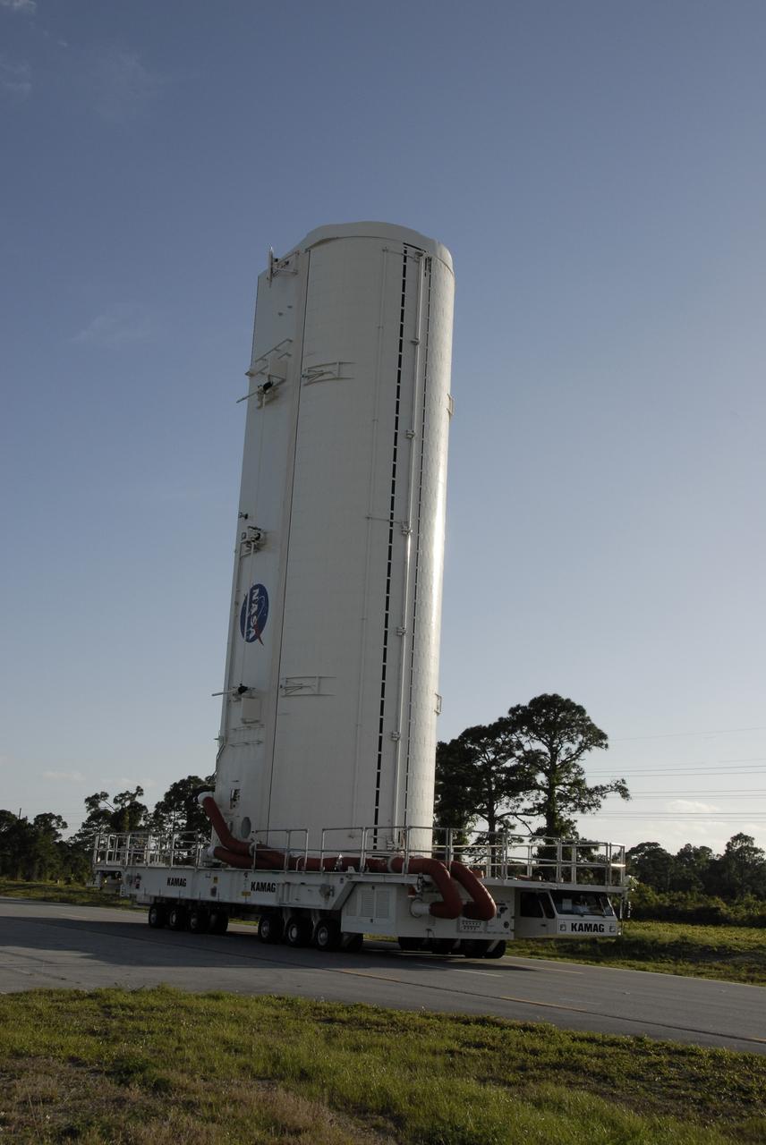CAPE CANAVERAL, Fla. –– At NASA's Kennedy Space Center in Florida, the payload canister with the Hubble Space Telescope equipment heads for Launch Pad 39A. On the pad, the Hubble equipment will be transferred to space shuttle Atlantis' payload bay. Atlantis' 11-day STS-125 mission to service Hubble is targeted for launch May 12. The flight will include five spacewalks in which astronauts will refurbish and upgrade the telescope with state-of-the-art science instruments. As a result, Hubble's capabilities will be expanded and its operational lifespan extended through at least 2014. Photo credit: NASA/Kim Shiflett