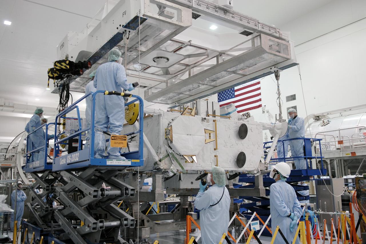 CAPE CANAVERAL, Fla. –– In the Space Station Processing Facility at NASA's Kennedy Space Center in Florida, the Japan Aerospace Exploration Agency's Kibo Exposed Facility, or EF, is being transferred to a workstand. When it is installed on the Kibo laboratory, the EF will provide a multipurpose platform where science experiments can be deployed and operated in the exposed environment. The payloads attached to the EF can be exchanged or retrieved by Kibo's robotic arm, the JEM Remote Manipulator System. The EF, along with the Experiment Logistics Module Exposed Section, will be carried aboard space shuttle Endeavour on the STS-127 mission targeted for launch June 13, 2009. Photo credit: NASA/Kim Shiflett