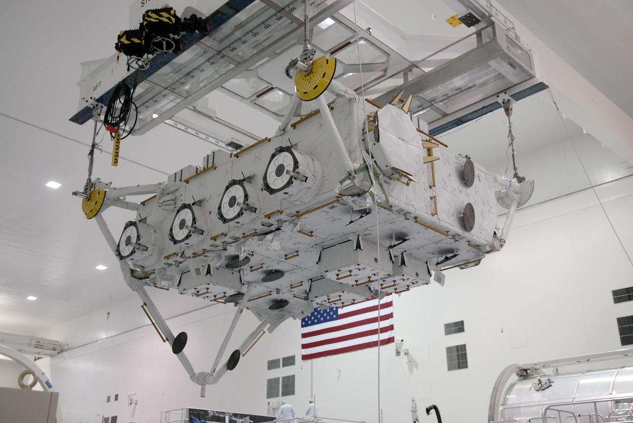 CAPE CANAVERAL, Fla. –– In the Space Station Processing Facility at NASA's Kennedy Space Center in Florida, the Japan Aerospace Exploration Agency's Kibo Exposed Facility, or EF, is lifted for transfer to a workstand. When it is installed on the Kibo laboratory, the EF will provide a multipurpose platform where science experiments can be deployed and operated in the exposed environment. The payloads attached to the EF can be exchanged or retrieved by Kibo's robotic arm, the JEM Remote Manipulator System. The EF, along with the Experiment Logistics Module Exposed Section, will be carried aboard space shuttle Endeavour on the STS-127 mission targeted for launch June 13, 2009. Photo credit: NASA/Kim Shiflett