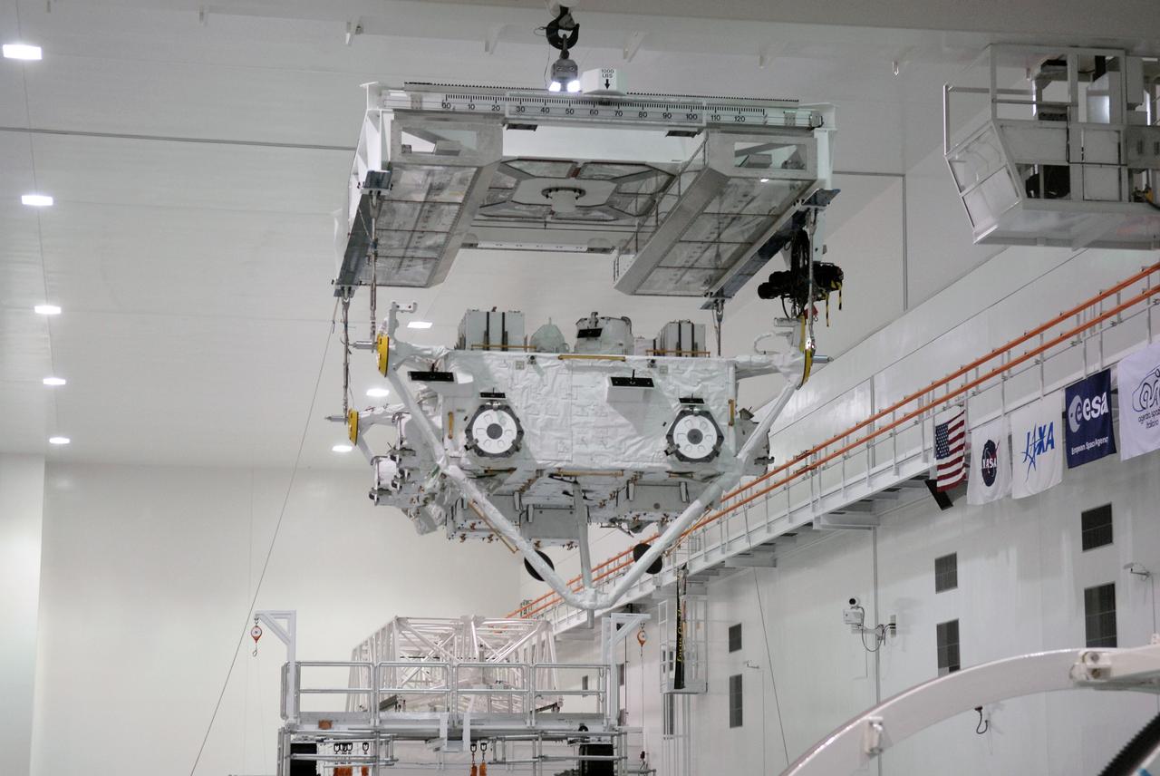 CAPE CANAVERAL, Fla. –– In the Space Station Processing Facility at NASA's Kennedy Space Center in Florida, the Japan Aerospace Exploration Agency's Kibo Exposed Facility, or EF, is moved across the room to transfer it to a workstand. When it is installed on the Kibo laboratory, the EF will provide a multipurpose platform where science experiments can be deployed and operated in the exposed environment. The payloads attached to the EF can be exchanged or retrieved by Kibo's robotic arm, the JEM Remote Manipulator System. The EF, along with the Experiment Logistics Module Exposed Section, will be carried aboard space shuttle Endeavour on the STS-127 mission targeted for launch June 13, 2009. Photo credit: NASA/Kim Shiflett
