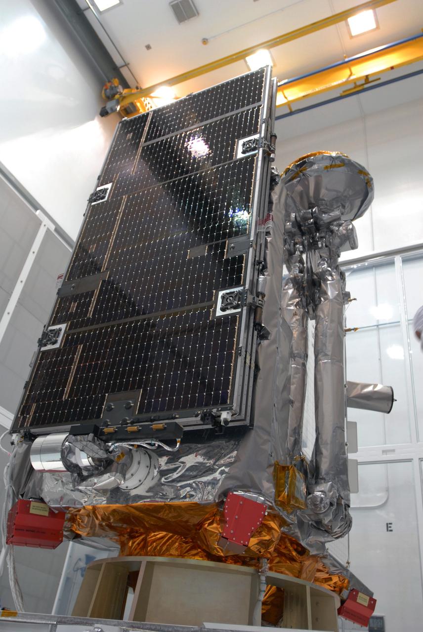 CAPE CANAVERAL, Fla. –– At Astrotech Space Operations in Titusville, Fla., the Lunar Reconnaissance Orbiter, or LRO, with a solar array panel installed.  The orbiter will carry seven instruments to provide scientists with detailed maps of the lunar surface and enhance our understanding of the moon's topography, lighting conditions, mineralogical composition and natural resources. Information gleaned from LRO will be used to select safe landing sites, determine locations for future lunar outposts and help mitigate radiation dangers to astronauts. The polar regions of the moon are the main focus of the mission because continuous access to sunlight may be possible and water ice may exist in permanently shadowed areas of the poles. Launch of LRO is targeted for June 2.  Photo credit: NASA/Jim Grossmann