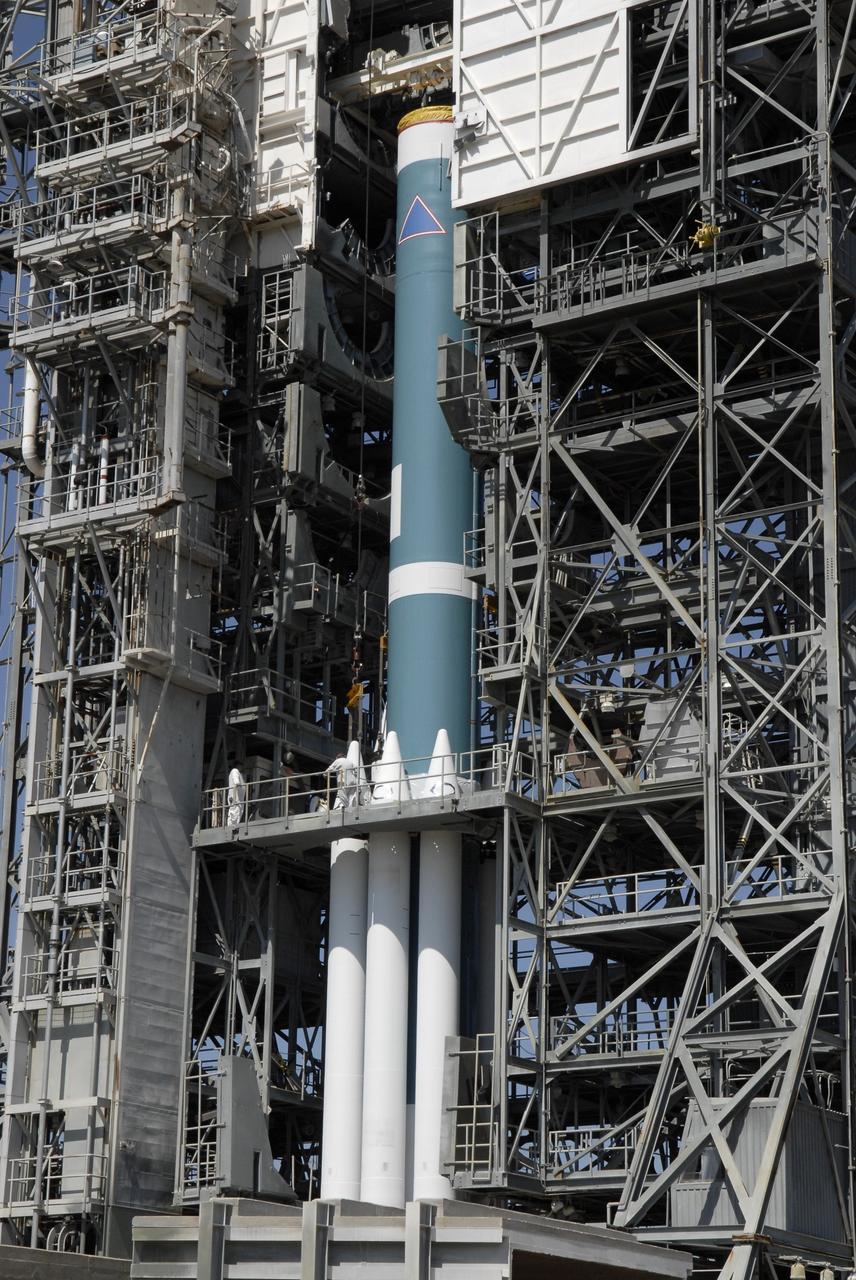 CAPE CANAVERAL, Fla. – On Launch Pad 17-B at Cape Canaveral Air Force Station, solid rocket boosters are installed on a Delta II rocket for launch of the STSS Demonstrator spacecraft. The spacecraft is a midcourse tracking technology demonstrator, part of an evolving ballistic missile defense system. STSS is capable of tracking objects after boost phase and provides trajectory information to other sensors. It will be launched by NASA for the Missile Defense Agency on July 29. Photo credit: NASA/Kim Shiflett
