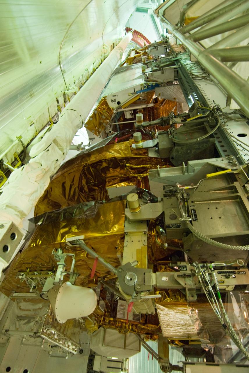 CAPE CANAVERAL, Fla. –– On Launch Pad 39A at NASA's Kennedy Space Center in Florida, the equipment and hardware needed to service the Hubble Space Telescope are transferred from the payload changeout room to space shuttle Atlantis' cargo bay. Launch of Atlantis' 11-day STS-125 mission to Hubble is targeted for May 12. The flight will include five spacewalks during which astronauts will refurbish and upgrade the telescope with state-of-the-art science instruments. As a result, Hubble's capabilities will be expanded and its operational lifespan extended through at least 2014. Photo credit: NASA/Jack Pfaller