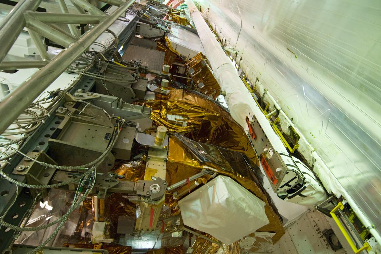 CAPE CANAVERAL, Fla. –– On Launch Pad 39A at NASA's Kennedy Space Center in Florida, the equipment and hardware needed to service the Hubble Space Telescope are transferred from the payload changeout room to space shuttle Atlantis' cargo bay.  Launch of Atlantis' 11-day STS-125 mission to Hubble is targeted for May 12. The flight will include five spacewalks during which astronauts will refurbish and upgrade the telescope with state-of-the-art science instruments. As a result, Hubble's capabilities will be expanded and its operational lifespan extended through at least 2014. Photo credit: NASA/Jack Pfaller
