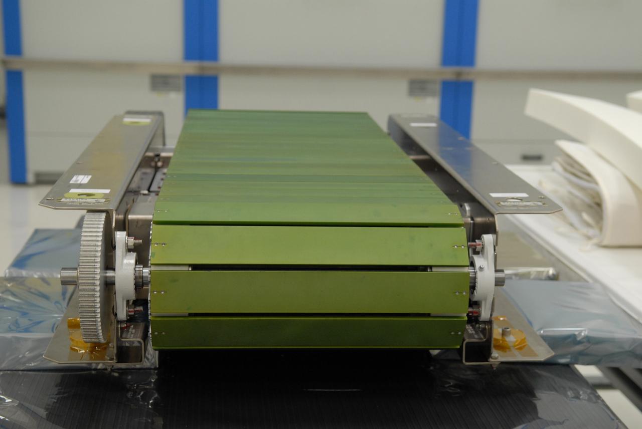 CAPE CANAVERAL, Fla. –– In the Space Station Processing Facility at NASA's Kennedy Space Center in Florida, preparations are under way to pack the Combined Operational Load Bearing External Resistance Treadmill, or COLBERT, for launch to the International Space Station on the space shuttle Discovery STS-128 mission.  The treadmill is named after comedian Stephen Colbert, the host of Comedy Central’s “The Colbert Report.” Colbert urged his viewers to suggest the name “Colbert” as the name for the station’s Node 3 module. Although his name did receive the most entries in an Internet polling contest, NASA chose the name “Tranquility” to honor the accomplishments of the Apollo 11 mission. COLBERT will be installed in Tranquility after the node arrives at the station next year. Launch of STS-128 is targeted for Aug. 6, 2009. Photo credit: NASA/Jack Pfaller