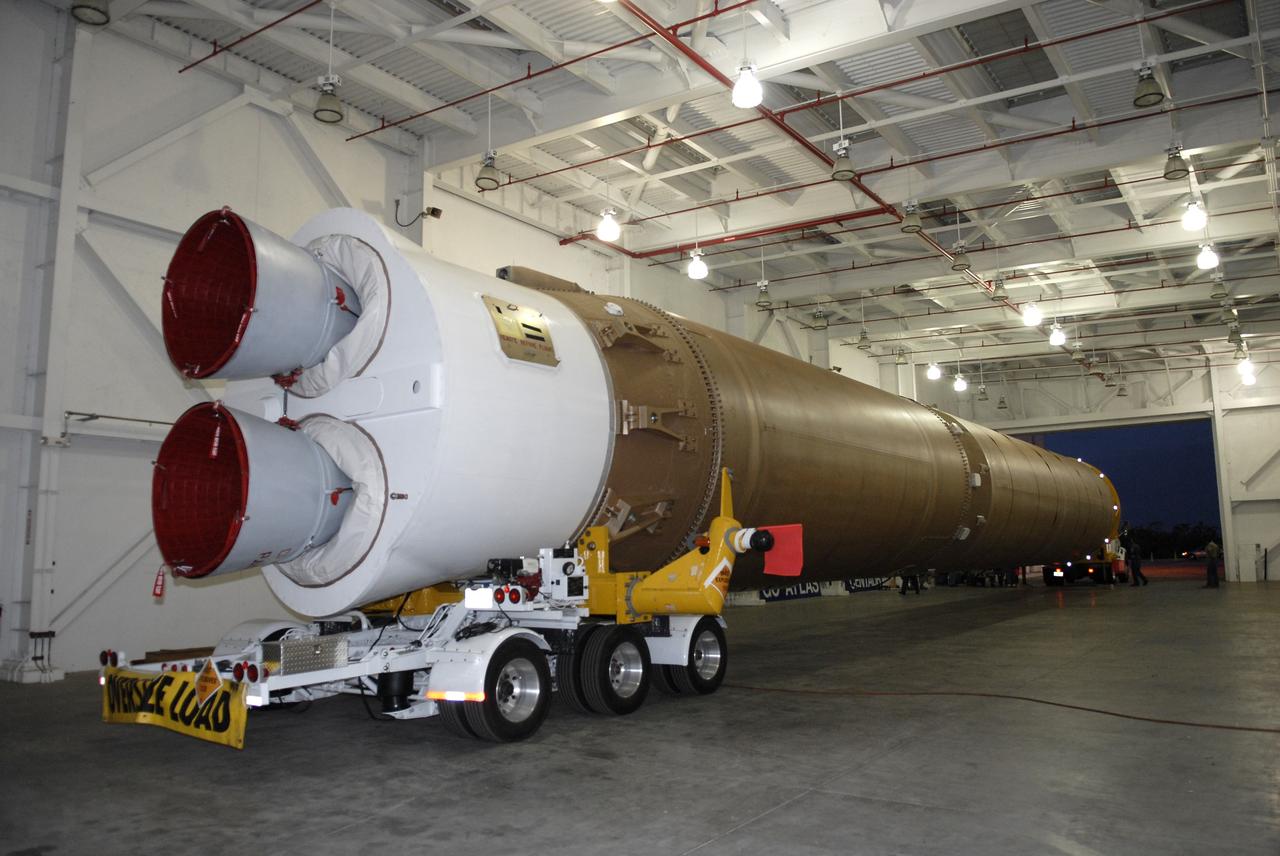 CAPE CANAVERAL, Fla. –– The Atlas V first stage is moved from the hangar at the Atlas Space Operations Facility. It is going to the Vertical Integration Facility near Cape Canaveral Air Force Station's Launch Complex 41. The Atlas V/Centaur is the launch vehicle for the Lunar Reconnaissance Orbiter, or LRO. The orbiter will carry seven instruments to provide scientists with detailed maps of the lunar surface and enhance our understanding of the moon's topography, lighting conditions, mineralogical composition and natural resources. Information gleaned from LRO will be used to select safe landing sites, determine locations for future lunar outposts and help mitigate radiation dangers to astronauts. Launch of LRO is targeted no earlier than June 2.  Photo credit: NASA/Kim Shiflett