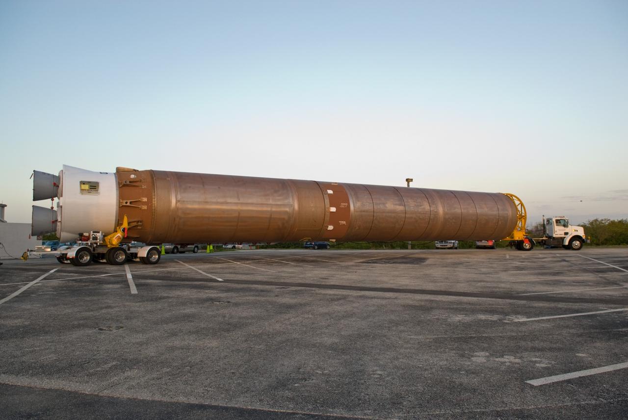 CAPE CANAVERAL, Fla. –– The Atlas V first stage is being transferred from the hangar at the Atlas Space Operations Facility to the Vertical Integration Facility near Cape Canaveral Air Force Station's Launch Complex 41.  The Atlas V/Centaur is the launch vehicle for the Lunar Reconnaissance Orbiter, or LRO. The orbiter will carry seven instruments to provide scientists with detailed maps of the lunar surface and enhance our understanding of the moon's topography, lighting conditions, mineralogical composition and natural resources. Information gleaned from LRO will be used to select safe landing sites, determine locations for future lunar outposts and help mitigate radiation dangers to astronauts. Launch of LRO is targeted no earlier than June 2.  Photo credit: NASA/Kim Shiflett