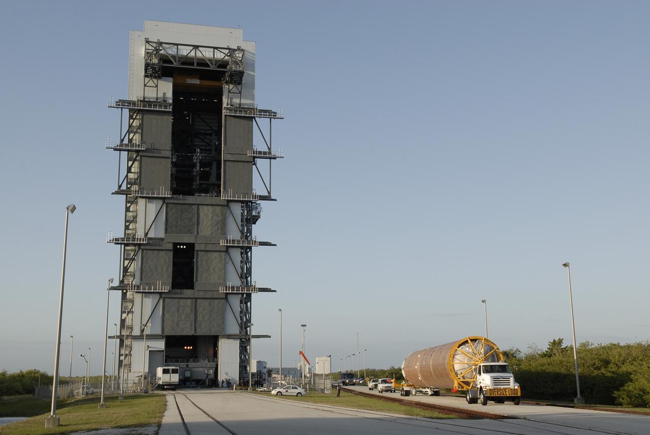 CAPE CANAVERAL, Fla. –– The Atlas V first stage arrives at the Vertical Integration Facility on Cape Canaveral Air Force Station's Launch Complex 41.  The Atlas V/Centaur is the launch vehicle for the Lunar Reconnaissance Orbiter, or LRO. The orbiter will carry seven instruments to provide scientists with detailed maps of the lunar surface and enhance our understanding of the moon's topography, lighting conditions, mineralogical composition and natural resources. Information gleaned from LRO will be used to select safe landing sites, determine locations for future lunar outposts and help mitigate radiation dangers to astronauts. Launch of LRO is targeted no earlier than June 2.  Photo credit: NASA/Kim Shiflett