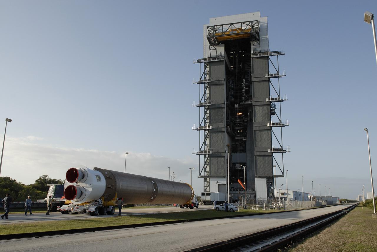 CAPE CANAVERAL, Fla. –– The Atlas V first stage arrives at the Vertical Integration Facility on Cape Canaveral Air Force Station's Launch Complex 41.  The Atlas V/Centaur is the launch vehicle for the Lunar Reconnaissance Orbiter, or LRO. The orbiter will carry seven instruments to provide scientists with detailed maps of the lunar surface and enhance our understanding of the moon's topography, lighting conditions, mineralogical composition and natural resources. Information gleaned from LRO will be used to select safe landing sites, determine locations for future lunar outposts and help mitigate radiation dangers to astronauts. Launch of LRO is targeted no earlier than June 2.  Photo credit: NASA/Kim Shiflett