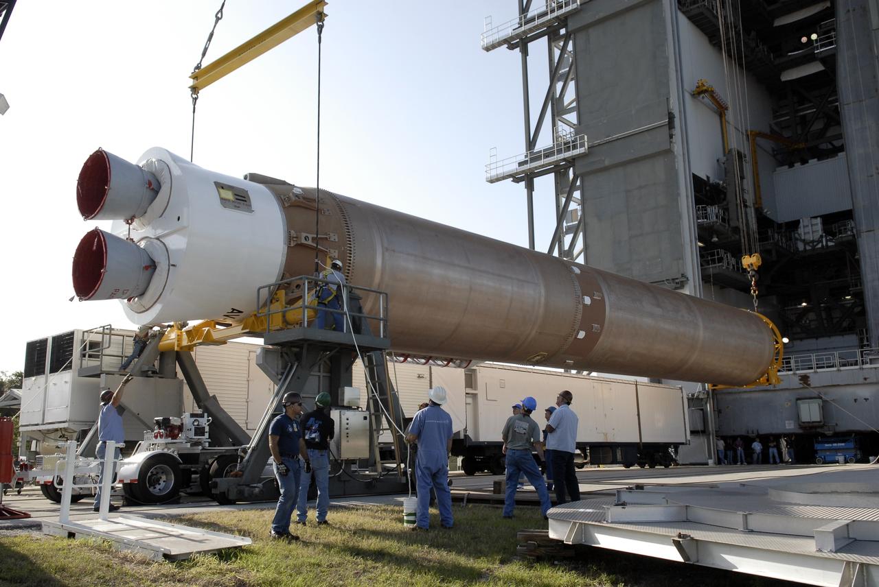 CAPE CANAVERAL, Fla. –– At the Vertical Integration Facility on Cape Canaveral Air Force Station's Launch Complex 41, cranes are attached to the Atlas V first stage to raise it to vertical. The Atlas will be lifted into the VIF. The Atlas V/Centaur is the launch vehicle for the Lunar Reconnaissance Orbiter, or LRO. The orbiter will carry seven instruments to provide scientists with detailed maps of the lunar surface and enhance our understanding of the moon's topography, lighting conditions, mineralogical composition and natural resources. Information gleaned from LRO will be used to select safe landing sites, determine locations for future lunar outposts and help mitigate radiation dangers to astronauts. Launch of LRO is targeted no earlier than June 2.  Photo credit: NASA/Kim Shiflett