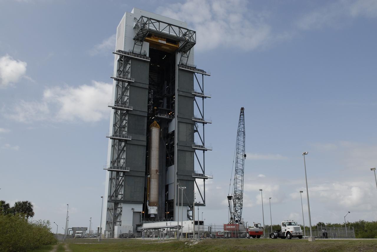 CAPE CANAVERAL, Fla. –– On Cape Canaveral Air Force Station's Launch Complex 41, the Atlas V first stage is being moved into the Vertical Integration Facility. The Atlas V/Centaur is the launch vehicle for the Lunar Reconnaissance Orbiter, or LRO. The orbiter will carry seven instruments to provide scientists with detailed maps of the lunar surface and enhance our understanding of the moon's topography, lighting conditions, mineralogical composition and natural resources. Information gleaned from LRO will be used to select safe landing sites, determine locations for future lunar outposts and help mitigate radiation dangers to astronauts. Launch of LRO is targeted no earlier than June 2.  Photo credit: NASA/Kim Shiflett