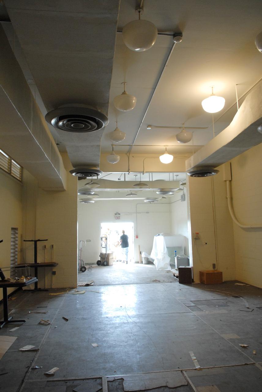 CAPE CANAVERAL, Fla. – Furniture and equipment is being moved out of the 50-year-old Mission Control Center on the Cape Canaveral Air Force Station in Florida. Out of use for many years, and with no valid operational or other use for the facility, NASA plans to demolish the site. The facility once controlled all manned Mercury space flights and the first two unmanned Gemini flights from May 1961-1963. It provided launch, orbital, re-entry and landing control for the flights. That function was later transferred to NASA's Johnson Space Center in Houston. Photo credit: NASA/Jack Pfaller