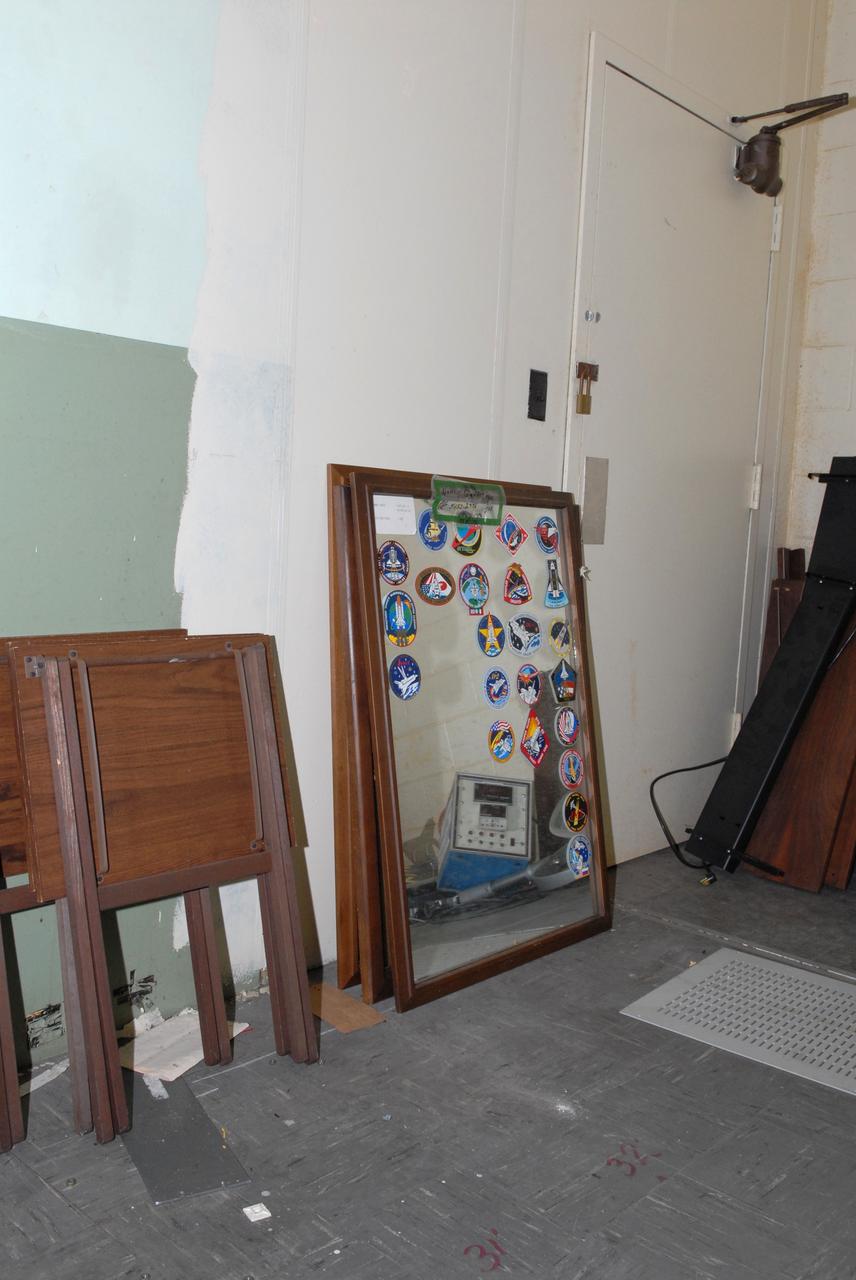 CAPE CANAVERAL, Fla. – Outdated furniture and display items are being moved out of the 50-year-old Mission Control Center on the Cape Canaveral Air Force Station in Florida. Out of use for many years, and with no valid operational or other use for the facility, NASA plans to demolish the site. The facility once controlled all manned Mercury space flights and the first two unmanned Gemini flights from May 1961-1963. It provided launch, orbital, re-entry and landing control for the flights. That function was later transferred to NASA's Johnson Space Center in Houston. Photo credit: NASA/Jack Pfaller