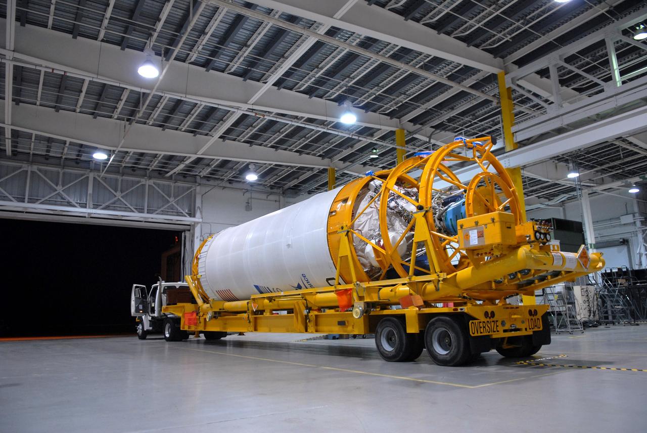 CAPE CANAVERAL, Fla. –– The Centaur upper stage leaves the Atlas Space Operations Facility in Titusville, Fla. It is being transferred to the Vertical Integration Facility near Cape Canaveral Air Force Station's Launch Complex 41, where it will be lifted onto the Atlas V first stage. The Atlas V/Centaur is the launch vehicle for NASA's Lunar Reconnaissance Orbiter, or LRO, and NASA's Lunar CRater Observation and Sensing Satellite, known as LCROSS.  LCROSS and LRO are the first missions in NASA's plan to return humans to the moon and begin establishing a lunar outpost by 2020.  Photo credit: NASA/Jack Pfaller