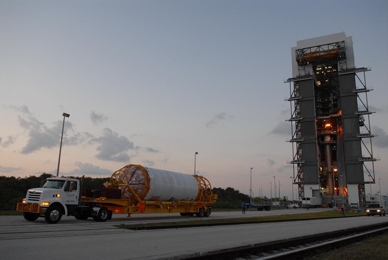CAPE CANAVERAL, Fla. –– The Centaur upper stage is transported to the Vertical Integration Facility near Cape Canaveral Air Force Station's Launch Complex 41, where it will be lifted onto the Atlas V first stage. The Atlas V/Centaur is the launch vehicle for NASA's Lunar Reconnaissance Orbiter, or LRO, and NASA's Lunar CRater Observation and Sensing Satellite, known as LCROSS.  LCROSS and LRO are the first missions in NASA's plan to return humans to the moon and begin establishing a lunar outpost by 2020.  Photo credit: NASA/Jack Pfaller