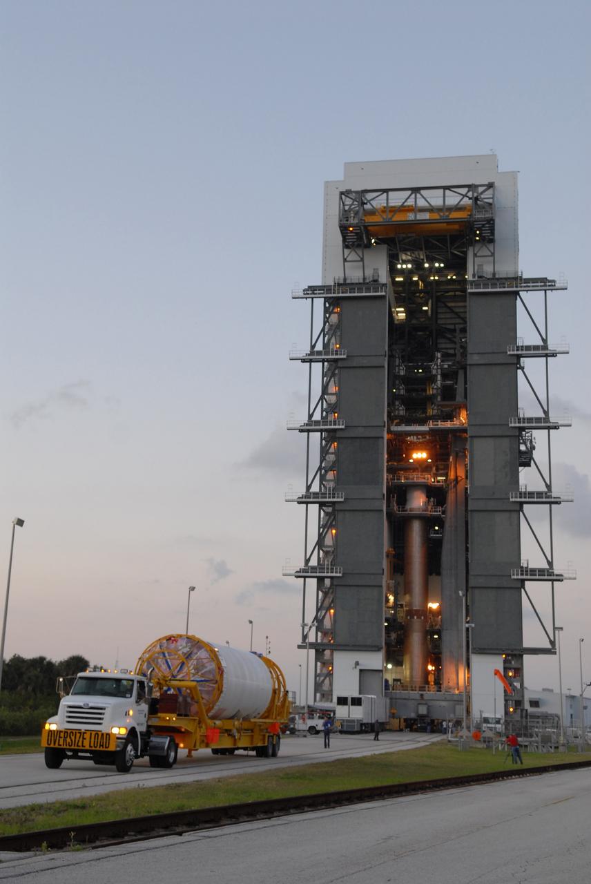 CAPE CANAVERAL, Fla. –– The Centaur upper stage is transported to the Vertical Integration Facility near Cape Canaveral Air Force Station's Launch Complex 41, where it will be lifted onto the Atlas V first stage, already in the tower. The Atlas V/Centaur is the launch vehicle for NASA's Lunar Reconnaissance Orbiter, or LRO, and NASA's Lunar CRater Observation and Sensing Satellite, known as LCROSS.  LCROSS and LRO are the first missions in NASA's plan to return humans to the moon and begin establishing a lunar outpost by 2020.  Photo credit: NASA/Jack Pfaller