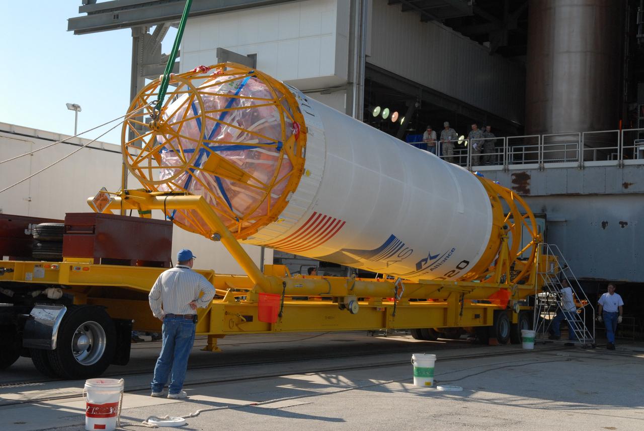 CAPE CANAVERAL, Fla. –– On Cape Canaveral Air Force Station's Launch Complex 41, the Centaur upper stage is raised from its transporter.  When it is vertical, it will be lifted into the Vertical Integration Facility for installation onto the Atlas V first stage, already in the tower.  The Atlas V/Centaur is the launch vehicle for NASA's Lunar Reconnaissance Orbiter, or LRO, and NASA's Lunar CRater Observation and Sensing Satellite, known as LCROSS.  LCROSS and LRO are the first missions in NASA's plan to return humans to the moon and begin establishing a lunar outpost by 2020.  Photo credit: NASA/Jack Pfaller