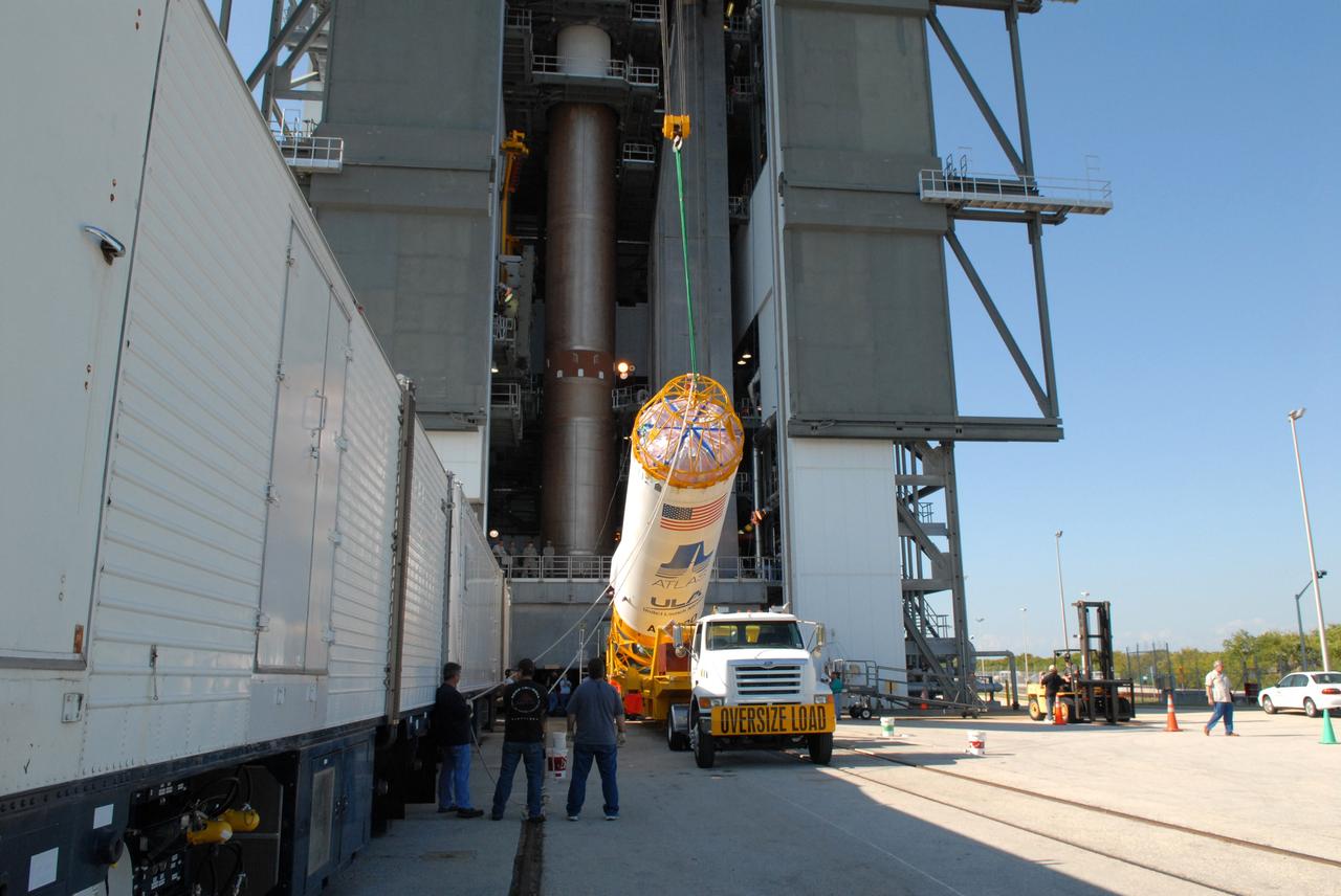 CAPE CANAVERAL, Fla. –– On Cape Canaveral Air Force Station's Launch Complex 41, the Centaur upper stage is raised from its transporter.  When it is vertical, it will be lifted into the Vertical Integration Facility for installation onto the Atlas V first stage, already in the tower.  The Atlas V/Centaur is the launch vehicle for NASA's Lunar Reconnaissance Orbiter, or LRO, and NASA's Lunar CRater Observation and Sensing Satellite, known as LCROSS.  LCROSS and LRO are the first missions in NASA's plan to return humans to the moon and begin establishing a lunar outpost by 2020.  Photo credit: NASA/Jack Pfaller