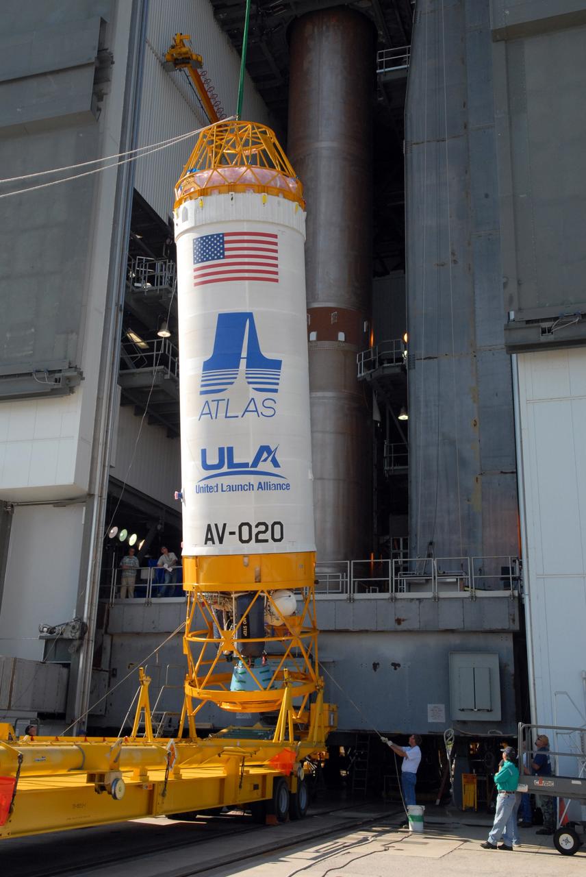 CAPE CANAVERAL, Fla. –– On Cape Canaveral Air Force Station's Launch Complex 41, the Centaur upper stage is nearly vertical.  It will be lifted into the Vertical Integration Facility for installation onto the Atlas V first stage, already in the tower.  The Atlas V/Centaur is the launch vehicle for NASA's Lunar Reconnaissance Orbiter, or LRO, and NASA's Lunar CRater Observation and Sensing Satellite, known as LCROSS.  LCROSS and LRO are the first missions in NASA's plan to return humans to the moon and begin establishing a lunar outpost by 2020.  Photo credit: NASA/Jack Pfaller