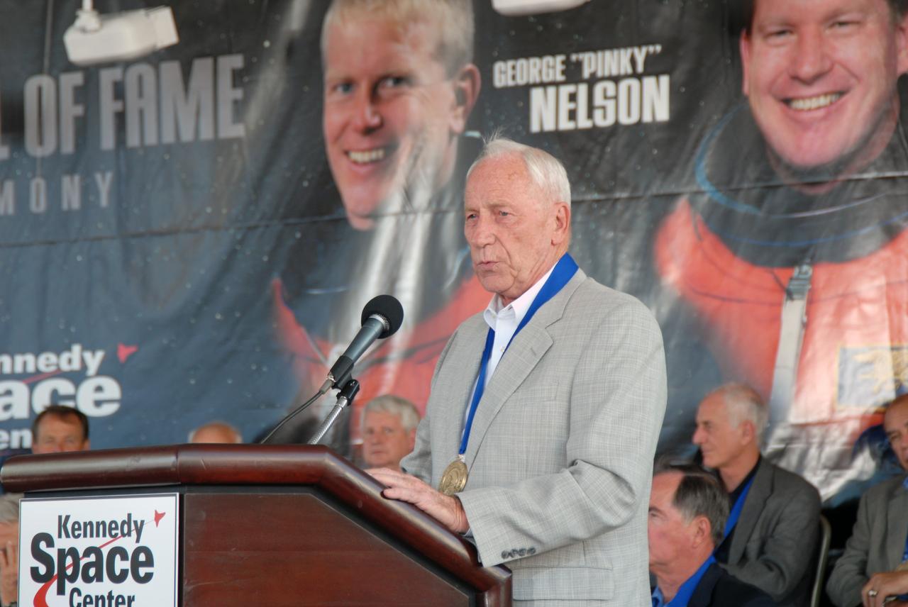 CAPE CANAVERAL, Fla. –– Hall of Fame astronaut Al Worden speaks during the U.S. Astronaut Hall of Fame induction ceremony held at Kennedy's Visitor Complex in Florida. Worden is a member of the hall of fame.  The ceremony took place May 2. More than 20 hall of fame astronauts attended, including Scott Carpenter, Walt Cunningham, Jim Lovell and Bob Crippen. Photo credit: NASA/Jim Grossmann