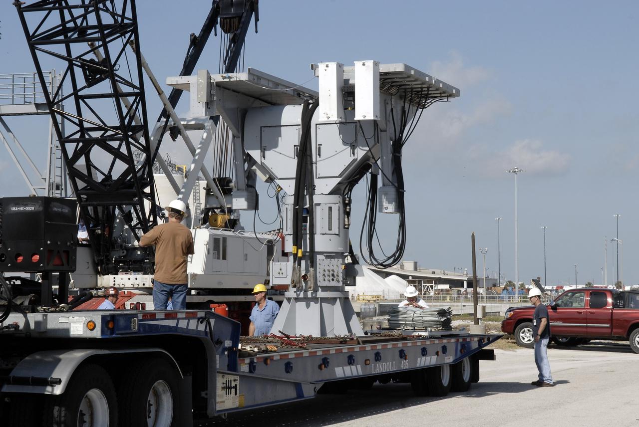 CAPE CANAVERAL, Fla. – In Port Canaveral, Fla., a crane is moved into position to lift the X-band radar onto the U.S. Army landing craft utility ship Brandy Station.  The radar will provide critical support during launch of space shuttle Atlantis on the STS-125 mission.  The radar will work with smaller X-band radars placed on the solid rocket booster retrieval ship Liberty Star to provide extremely high-resolution images of any debris that might be created during Atlantis' launch.  Photo credit: NASA/Kim Shiflett