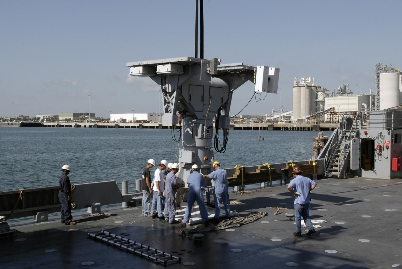 CAPE CANAVERAL, Fla. – In Port Canaveral, Fla.,  technicians help place the X-band radar on the deck of the U.S. Army landing craft utility ship Brandy Station. The radar will provide critical support during launch of space shuttle Atlantis on the STS-125 mission.  The radar will work with smaller X-band radars placed on the solid rocket booster retrieval ship Liberty Star to provide extremely high-resolution images of any debris that might be created during Atlantis' launch.  Photo credit: NASA/Kim Shiflett
