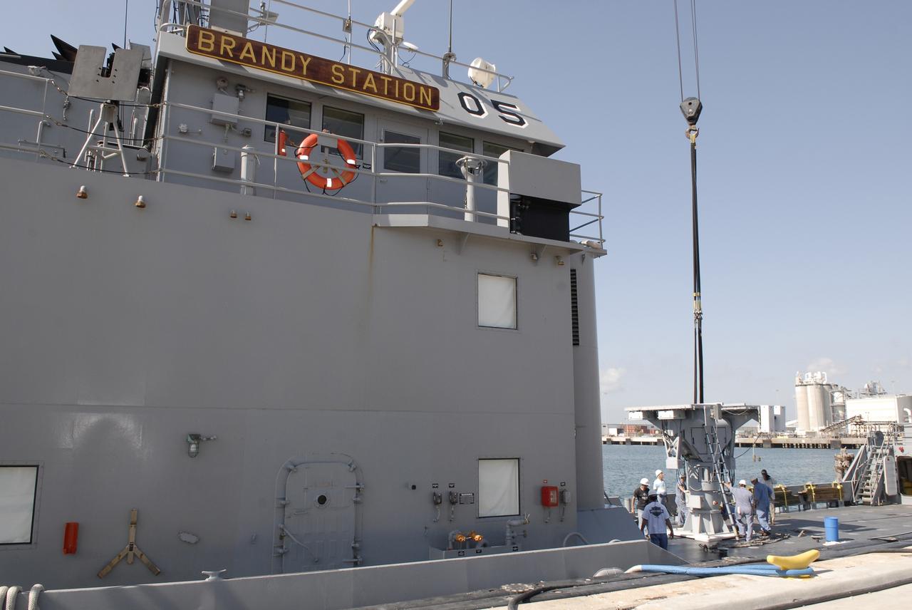 CAPE CANAVERAL, Fla. – In Port Canaveral, Fla.,  technicians complete installation of the X-band radar (right) on the deck of the U.S. Army landing craft utility ship Brandy Station. The radar will provide critical support during launch of space shuttle Atlantis on the STS-125 mission.  The radar will work with smaller X-band radars placed on the solid rocket booster retrieval ship Liberty Star to provide extremely high-resolution images of any debris that might be created during Atlantis' launch.  Photo credit: NASA/Kim Shiflett