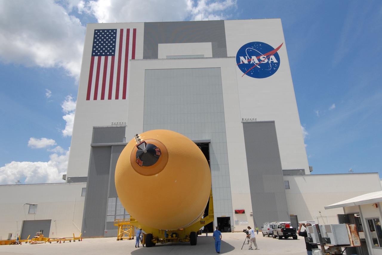 CAPE CANAVERAL, Fla. – The external fuel tank, ET- 132, designated for use with space shuttle Discovery on the STS-128 mission moves toward the open door of the Vehicle Assembly Building at NASA's Kennedy Space Center in Florida. The tank will be moved into a high bay for checkout. On the STS-128 mission, Discovery will carry science and storage racks to the International Space Station. Launch of Discovery is targeted for Aug. 6. Photo credit: NASA/Jack Pfaller