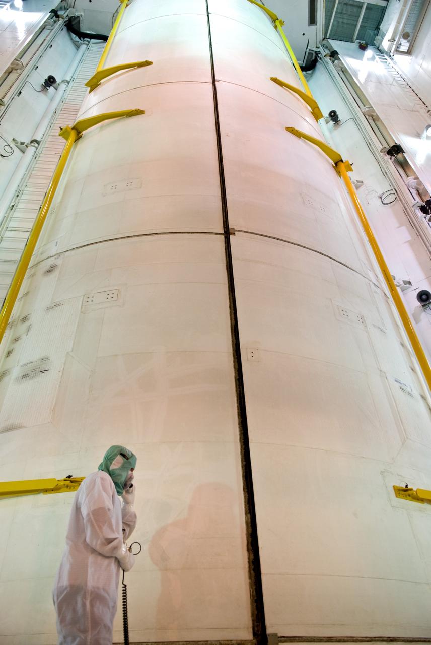 CAPE CANAVERAL, Fla. – On Launch Pad 39A at NASA's Kennedy Space Center in Florida, space shuttle Atlantis' payload bay doors are closed around the hardware for the STS-125 mission to service NASA's Hubble Space Telescope. The hardware includes the Flight Support System with the Soft Capture mechanism and Multi-Use Lightweight Equipment Carrier with the Science Instrument Command and Data Handling Unit, or SIC&DH; the Orbital Replacement Unit Carrier with the Cosmic Origins Spectrograph, or COS; an IMAX 3D camera; and the Super Lightweight Interchangeable Carrier with the Wide Field Camera 3. Atlantis' crew will service NASA's Hubble Space Telescope for the fifth and final time. The flight will include five spacewalks during which astronauts will refurbish and upgrade the telescope with state-of-the-art science instruments. As a result, Hubble's capabilities will be expanded and its operational lifespan extended through at least 2014. Launch is scheduled for 2:01 p.m. EDT on May 11. Photo credit: NASA/Kim Shiflett