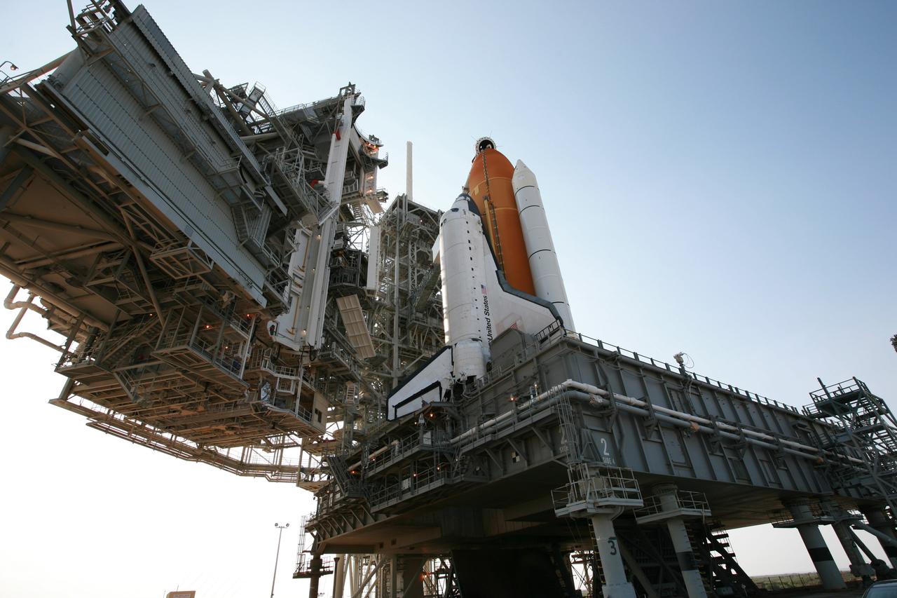 CAPE CANAVERAL, Fla. – On Launch Pad 39A at NASA's Kennedy Space Center in Florida, space shuttle Atlantis seems to tower above the mobile launcher platform after the pad’s rotating service structure, or RSS, has been rolled back.   The RSS is retracted in preparation for Atlantis’ liftoff on the STS-125 mission to service NASA's Hubble Space Telescope.  The rotating structure provides protected access to the shuttle for changeout and servicing of payloads at the pad. After the RSS is rolled back, the orbiter is ready for fuel cell activation and external tank cryogenic propellant loading operations.  Atlantis' crew will service NASA's Hubble Space Telescope for the fifth and final time. The flight will include five spacewalks during which astronauts will refurbish and upgrade the telescope with state-of-the-art science instruments. As a result, Hubble's capabilities will be expanded and its operational lifespan extended through at least 2014. Launch is scheduled for 2:01 p.m. EDT on May 11.  Photo credit: NASA/Dimitri Gerondidakis
