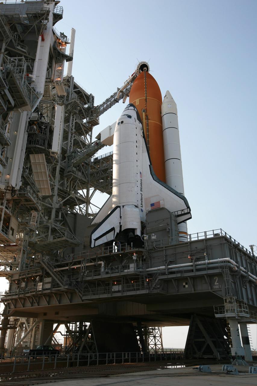 CAPE CANAVERAL, Fla. – On Launch Pad 39A at NASA's Kennedy Space Center in Florida, space shuttle Atlantis is revealed after the rotating service structure, or RSS, has been rolled back.  The RSS is retracted in preparation for Atlantis’ liftoff on the STS-125 mission to service NASA's Hubble Space Telescope.  The rotating structure provides protected access to the shuttle for changeout and servicing of payloads at the pad. After the RSS is rolled back, the orbiter is ready for fuel cell activation and external tank cryogenic propellant loading operations.  Atlantis' crew will service NASA's Hubble Space Telescope for the fifth and final time. The flight will include five spacewalks during which astronauts will refurbish and upgrade the telescope with state-of-the-art science instruments. As a result, Hubble's capabilities will be expanded and its operational lifespan extended through at least 2014. Launch is scheduled for 2:01 p.m. EDT on May 11.  Photo credit: NASA/Dimitri Gerondidakis