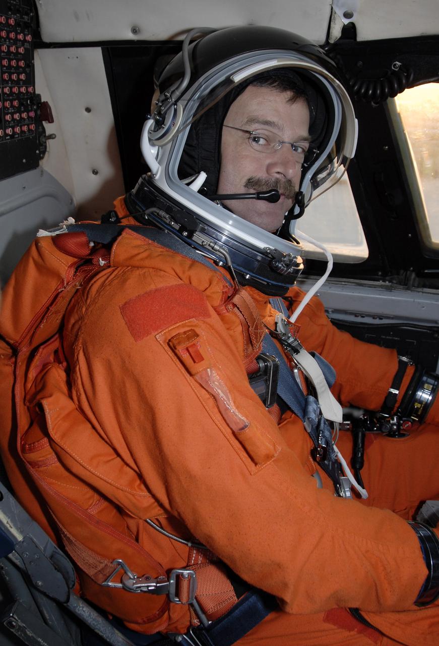 CAPE CANAVERAL, Fla. – On the Shuttle Landing Facility at NASA's Kennedy Space Center in Florida, STS-125 Commander Scott Altman is wearing his complete launch-and-entry suit in the cockpit of the Shuttle Training Aircraft.  He is preparing to practice shuttle landings in preparation for launch of space shuttle Atlantis, scheduled for 2:01 p.m. EDT on May 11. On Atlantis’ STS-125 mission, NASA's Hubble Space Telescope will be serviced for the fifth and final time.  The flight will include five spacewalks during which astronauts will refurbish and upgrade the telescope with state-of-the-art science instruments. As a result, Hubble's capabilities will be expanded and its operational lifespan extended through at least 2014.  Photo credit: NASA/Kim Shiflett