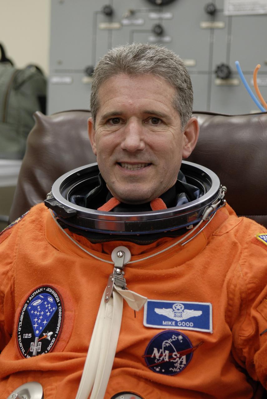 CAPE CANAVERAL, Fla. – STS-125 Mission Specialist Michael Good puts on his launch-and-entry suit before heading for Launch Pad 39A at NASA's Kennedy Space Center in Florida.  This launch will be Good's first space shuttle flight.  Liftoff is scheduled for 2:01 p.m. May 11 EDT.  Atlantis' 11-day flight will include five spacewalks to refurbish and upgrade NASA's Hubble Space Telescope with state-of-the-art science instruments that will expand Hubble's capabilities and extend its operational lifespan through at least 2014.  The payload includes a Wide Field Camera 3, fine guidance sensor and the Cosmic Origins Spectrograph. Photo credit: NASA/Kim Shiflett