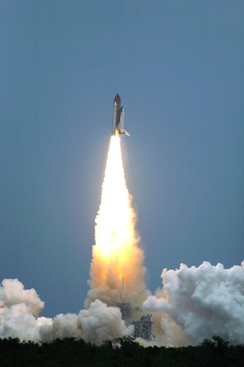 CAPE CANAVERAL, Fla. – Riding a column of fire, space shuttle Atlantis hurtles into the cloud-washed sky over NASA's Kennedy Space Center in Florida.  Atlantis and its crew of seven will rendezvous with NASA's Hubble Space Telescope.  The launch was on-time at 2:01 p.m. EDT. Atlantis' 11-day flight will include five spacewalks to refurbish and upgrade the telescope with state-of-the-art science instruments that will expand Hubble's capabilities and extend its operational lifespan through at least 2014.  The payload includes a Wide Field Camera 3, fine guidance sensor and the Cosmic Origins Spectrograph.   Photo credit: NASA/Fletcher Hildreth