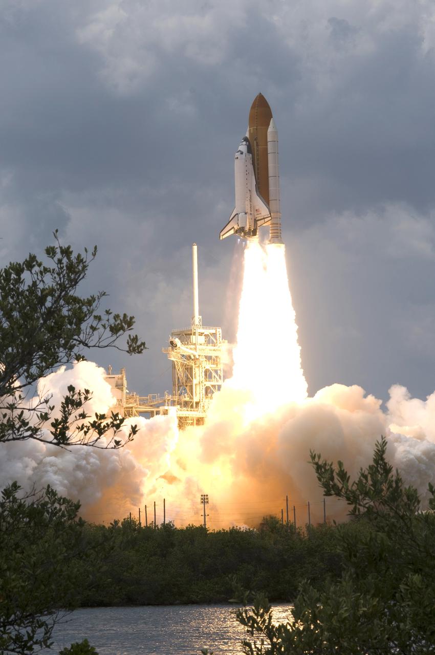 CAPE CANAVERAL, Fla. – Clouds of smoke and steam billow across Launch Pad 39A at NASA's Kennedy Space Center in Florida as space shuttle Atlantis rides a column of fire into space on the STS-125 mission. Atlantis will rendezvous with NASA's Hubble Space Telescope. Liftoff was on time at 2:01 p.m. EDT. Atlantis' 11-day flight will include five spacewalks to refurbish and upgrade the telescope with state-of-the-art science instruments that will expand Hubble's capabilities and extend its operational lifespan through at least 2014.  The payload includes a Wide Field Camera 3, fine guidance sensor and the Cosmic Origins Spectrograph.  Photo credit: NASA/Sandra Joseph-Kevin O'Connell