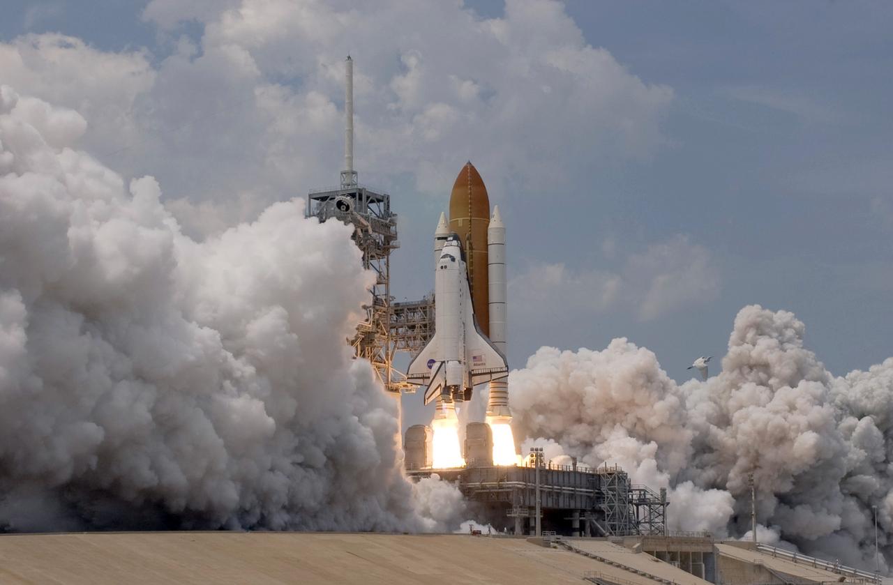 CAPE CANAVERAL, Fla. – On Launch Pad 39A at NASA's Kennedy Space Center in Florida, space shuttle Atlantis rides twin columns of fire as it heads for space on the STS-125 mission.  Atlantis will rendezvous with NASA's Hubble Space Telescope.  Liftoff was on time at 2:01 p.m. EDT. Atlantis' 11-day flight will include five spacewalks to refurbish and upgrade the telescope with state-of-the-art science instruments that will expand Hubble's capabilities and extend its operational lifespan through at least 2014.  The payload includes a Wide Field Camera 3, fine guidance sensor and the Cosmic Origins Spectrograph.  Photo credit: NASA/Sandra Joseph-Kevin O'Connell