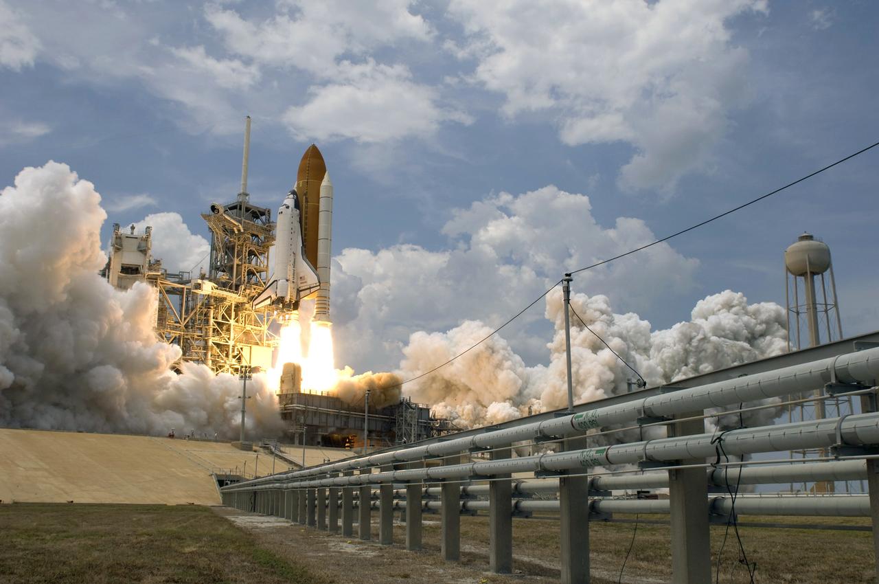 CAPE CANAVERAL, Fla. – A camera near Launch Pad 39A at NASA's Kennedy Space Center in Florida captures the liftoff of space shuttle Atlantis on the STS-125 mission to service NASA's Hubble Space Telescope. Liftoff was on time at 2:01 p.m. EDT. Atlantis' 11-day flight will include five spacewalks to refurbish and upgrade the telescope with state-of-the-art science instruments that will expand Hubble's capabilities and extend its operational lifespan through at least 2014.  The payload includes a Wide Field Camera 3, fine guidance sensor and the Cosmic Origins Spectrograph.  Photo credit: NASA/Sandra Joseph-Kevin O'Connell