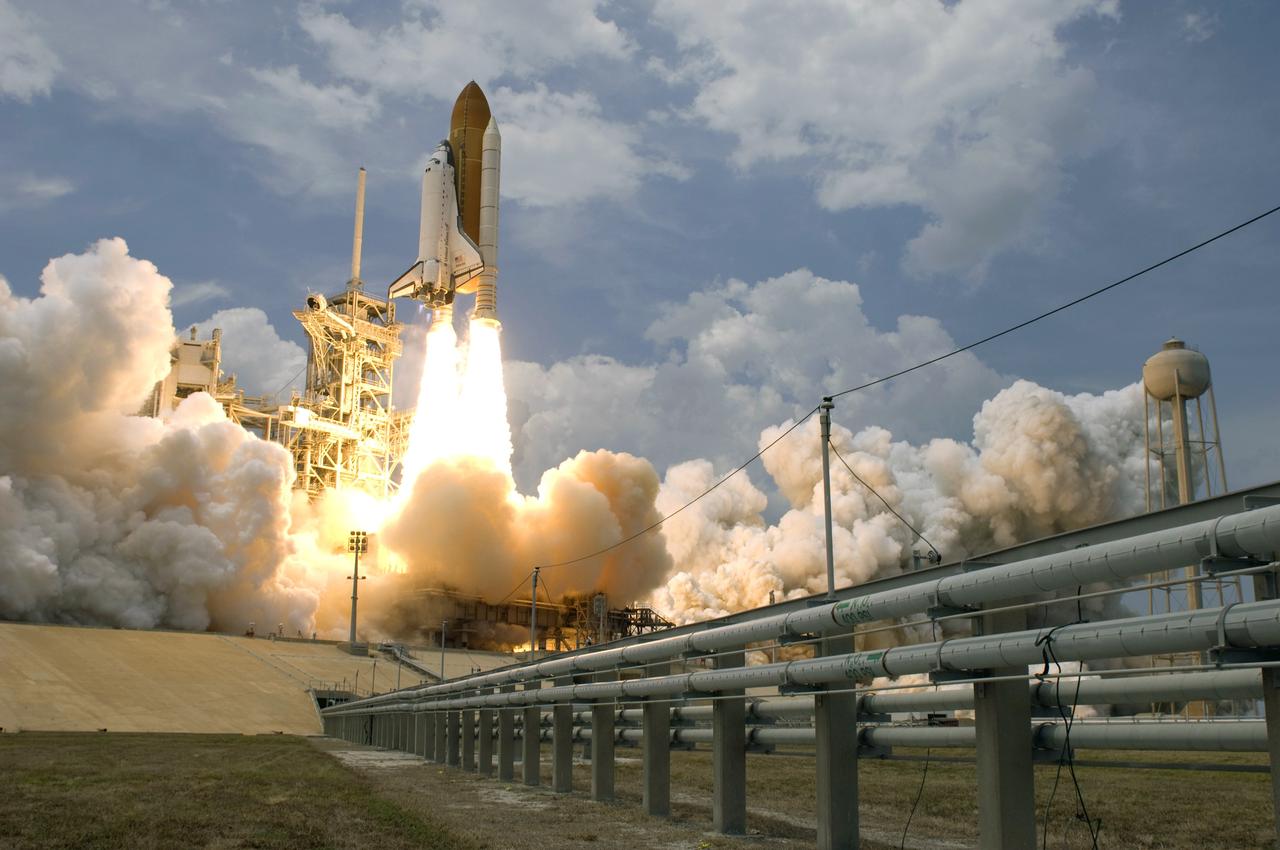 CAPE CANAVERAL, Fla. – A camera near Launch Pad 39A at NASA's Kennedy Space Center in Florida captures the liftoff of space shuttle Atlantis on the STS-125 mission to service NASA's Hubble Space Telescope. Liftoff was on time at 2:01 p.m. EDT. Atlantis' 11-day flight will include five spacewalks to refurbish and upgrade the telescope with state-of-the-art science instruments that will expand Hubble's capabilities and extend its operational lifespan through at least 2014.  The payload includes a Wide Field Camera 3, fine guidance sensor and the Cosmic Origins Spectrograph.  Photo credit: NASA/Sandra Joseph-Kevin O'Connell