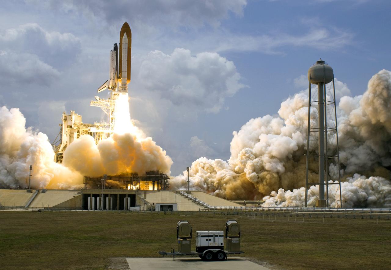 CAPE CANAVERAL, Fla. – Clouds of smoke and steam billow across Launch Pad 39A at NASA's Kennedy Space Center in Florida as space shuttle Atlantis roars into space on the STS-125 mission to service NASA's Hubble Space Telescope.  Liftoff was on time at 2:01 p.m. EDT.  Atlantis' 11-day flight will include five spacewalks to refurbish and upgrade the telescope with state-of-the-art science instruments that will expand Hubble's capabilities and extend its operational lifespan through at least 2014.  The payload includes a Wide Field Camera 3, Fine Guidance Sensor and the Cosmic Origins Spectrograph.  Photo courtesy of Scott Andrews