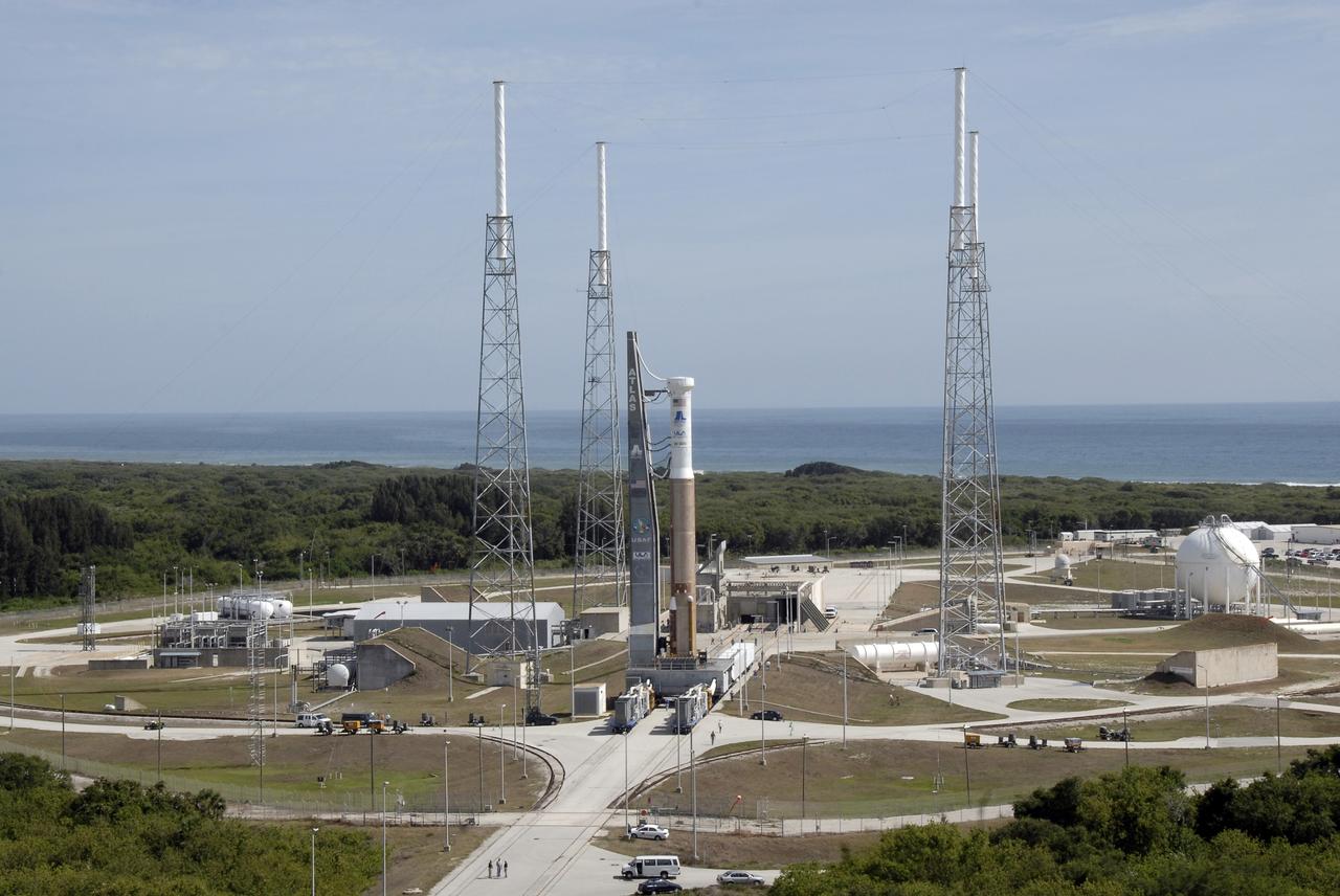 CAPE CANAVERAL, Fla. – The Atlas V/Centaur arrives on Launch Complex-41 at Cape Canaveral Air Force Station in Florida. Lightning towers surround the pad for protection against possible lightning strikes. The Atlas was rolled to the launch pad from the Vertical Integration Facility in preparation for the wet dress rehearsal, or countdown test, which means being fully loaded with propellants including liquid hydrogen, liquid oxygen and RP-1 fuel. The launch vehicle will be rolled off the pad and returned to the VIF on May 16. The Atlas V/Centaur is the launch vehicle for NASA's Lunar Reconnaissance Orbiter, or LRO, and NASA's Lunar CRater Observation and Sensing Satellite, known as LCROSS. They will be mated with the Atlas in late May. LCROSS and LRO are the first missions in NASA's plan to return humans to the moon and begin establishing a lunar outpost by 2020. Launch is scheduled for no earlier than June 17.  Photo credit: NASA/Kim Shiflett