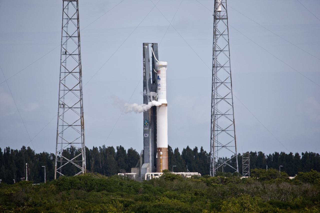 CAPE CANAVERAL, Fla. – At Launch Complex-41 on Cape Canaveral Air Force Station in Florida, the Atlas V/Centaur is undergoing a wet dress rehearsal, or countdown test. The Atlas V is being fully loaded with propellants including liquid hydrogen, liquid oxygen and RP-1 fuel. Surrounding the vehicle are four lightning towers. Following the rehearsal, the launch vehicle will be rolled off the pad and returned to the Vertical Integration Facility on May 16. The Atlas V/Centaur is the launch vehicle for NASA's Lunar Reconnaissance Orbiter, or LRO, and NASA's Lunar CRater Observation and Sensing Satellite, known as LCROSS. They will be mated with the Atlas in late May. LCROSS and LRO are the first missions in NASA's plan to return humans to the moon and begin establishing a lunar outpost by 2020. Launch is scheduled for no earlier than June 17. Photo credit: NASA/Dimitri Gerondidakis