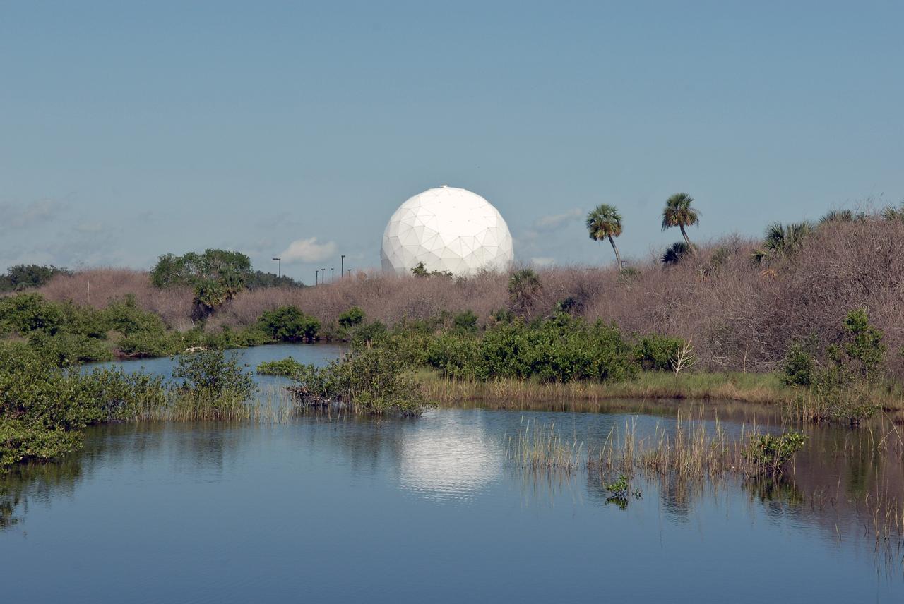 CAPE CANAVERAL, Fla. – This is the radome beneath which is the NASA Debris Radar.  It is located at a remote site on North Merritt Island in Florida.  One of the largest of its kind in the world, the C-band radar provided critical support to pinpoint debris during the launch of space shuttle Atlantis on the STS-125 mission. The need for this radar was identified after the Columbia tragedy.  It worked together with smaller X-band radars placed on the solid rocket booster ship Liberty Star and the U.S. Army landing craft utility ship Brandy Station.  Together they provided extremely high resolution images of any debris that created by Atlantis during launch.  Photo credit: NASA/Troy Cryder