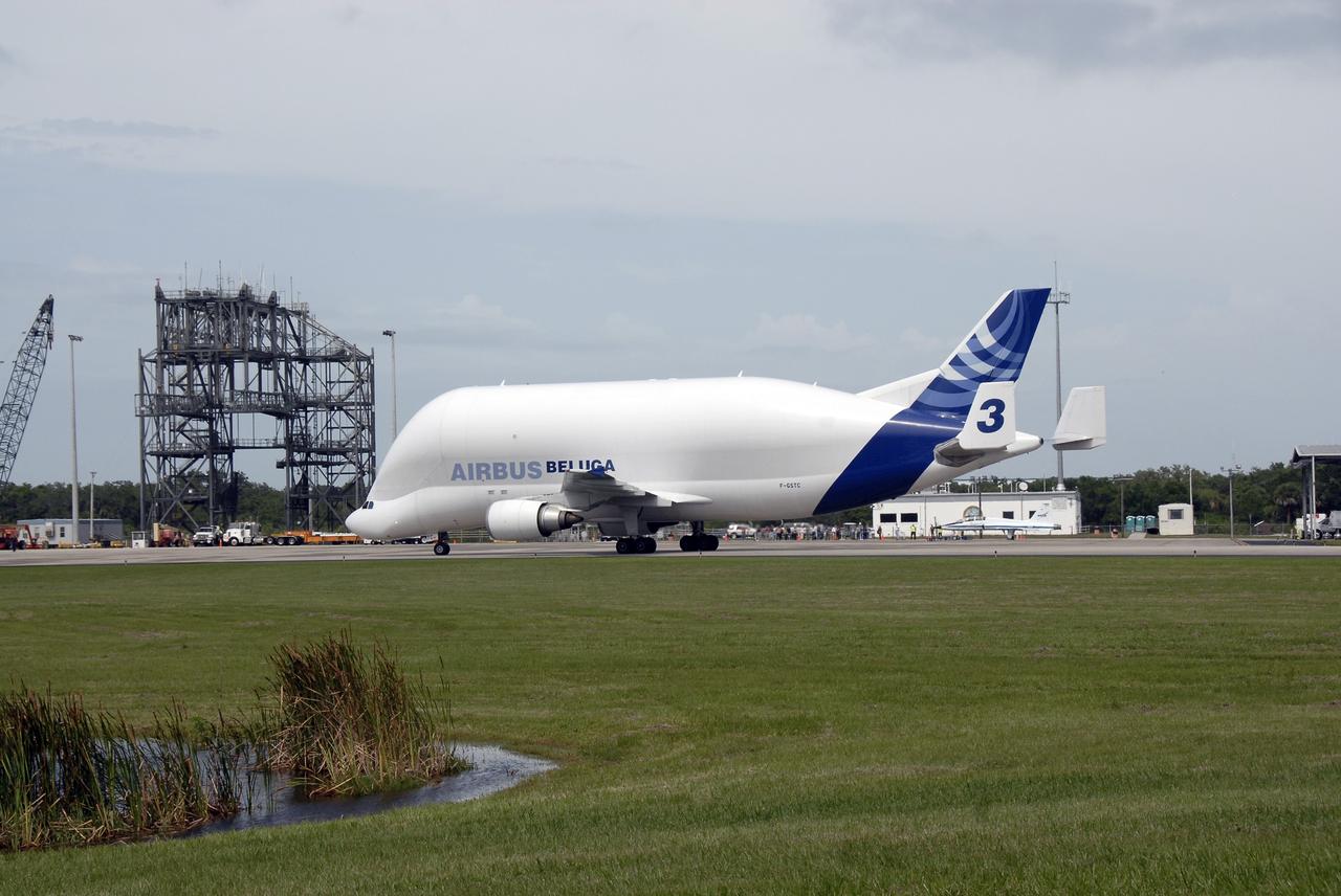 CAPE CANAVERAL, Fla. – A Beluga Airbus  taxis near the mate/demate device at NASA Kennedy Space Center's Shuttle Landing Facility.  The aircraft carries the newest module for the International Space Station, the Tranquility Node 3. Tranquility will eventually house the life support equipment necessary for the International Space Station's permanent crew of six. It will also accommodate the European Space Agency's Cupola observation module, a seven window dome-shaped structure.  Tranquility is the payload on the STS-130 mission, targeted for launch in February 2010.  Photo credit: NASA/Kim Shiflett