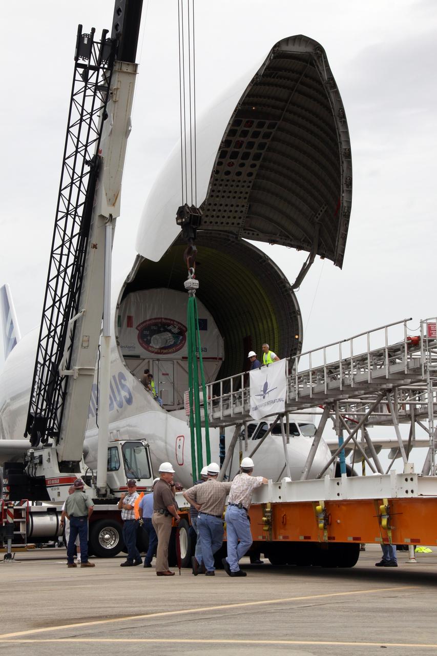 CAPE CANAVERAL, Fla. – On the Shuttle Landing Facility at NASA's Kennedy Space Center in Florida, the Node 3 module is being unloaded from the Beluga Airbus.  Named Tranquility, the module will be delivered to the International Space Station on the STS-130 mission.  Tranquility will eventually house the life support equipment necessary for the space station's permanent crew of six. It will also accommodate the European Space Agency's Cupola observation module, a seven-window, dome-shaped structure.  Tranquility is targeted for launch aboard space shuttle Endeavour in February 2010.  Photo credit: NASA/Jack Pfaller