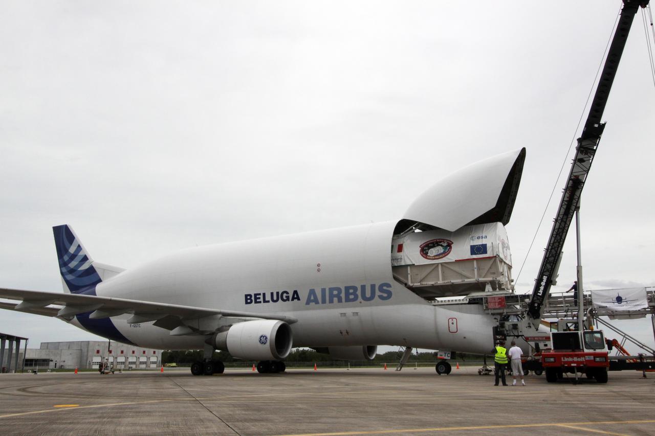 CAPE CANAVERAL, Fla. – On the Shuttle Landing Facility at NASA's Kennedy Space Center in Florida, the Node 3 module moves out of the Beluga Airbus.  Named Tranquility, the module will be delivered to the International Space Station on the STS-130 mission. Tranquility will eventually house the life support equipment necessary for the space station's permanent crew of six. It will also accommodate the European Space Agency's Cupola observation module, a seven-window, dome-shaped structure.  Tranquility is targeted for launch aboard space shuttle Endeavour in February 2010.  Photo credit: NASA/Jack Pfaller